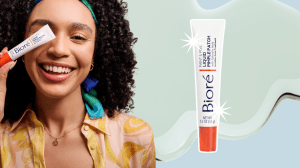 A green and blue background with a woman holding a white tube of Biore liquid pimple patches. A standalone tube of Biore liquid pimple patches